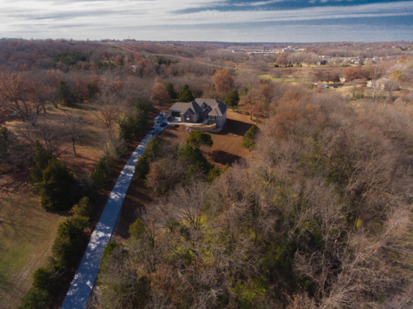 aerial view of an acreage tear-down and custom home rebuild
